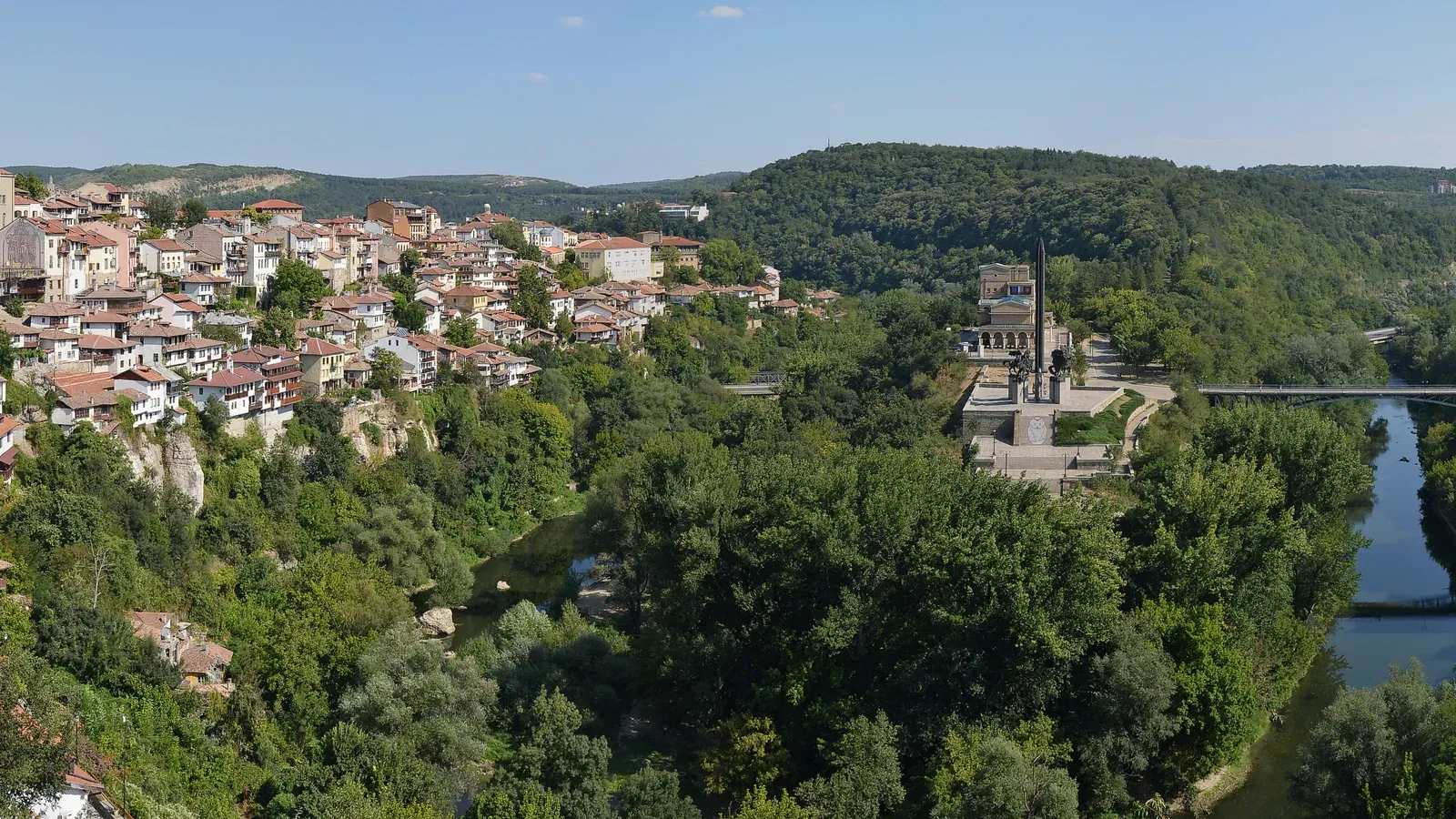 Veliko Tarnovo's red-roofed houses on wooded cliffs above the Yantra River, Bulgaria