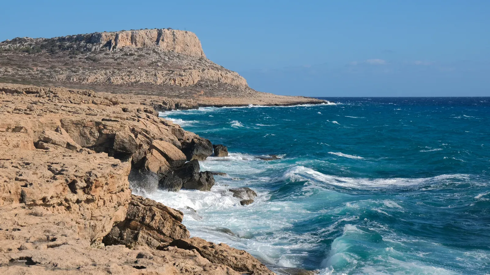 Limestone cliffs and deep blue sea at Cape Greco on the southeast coast of Cyprus