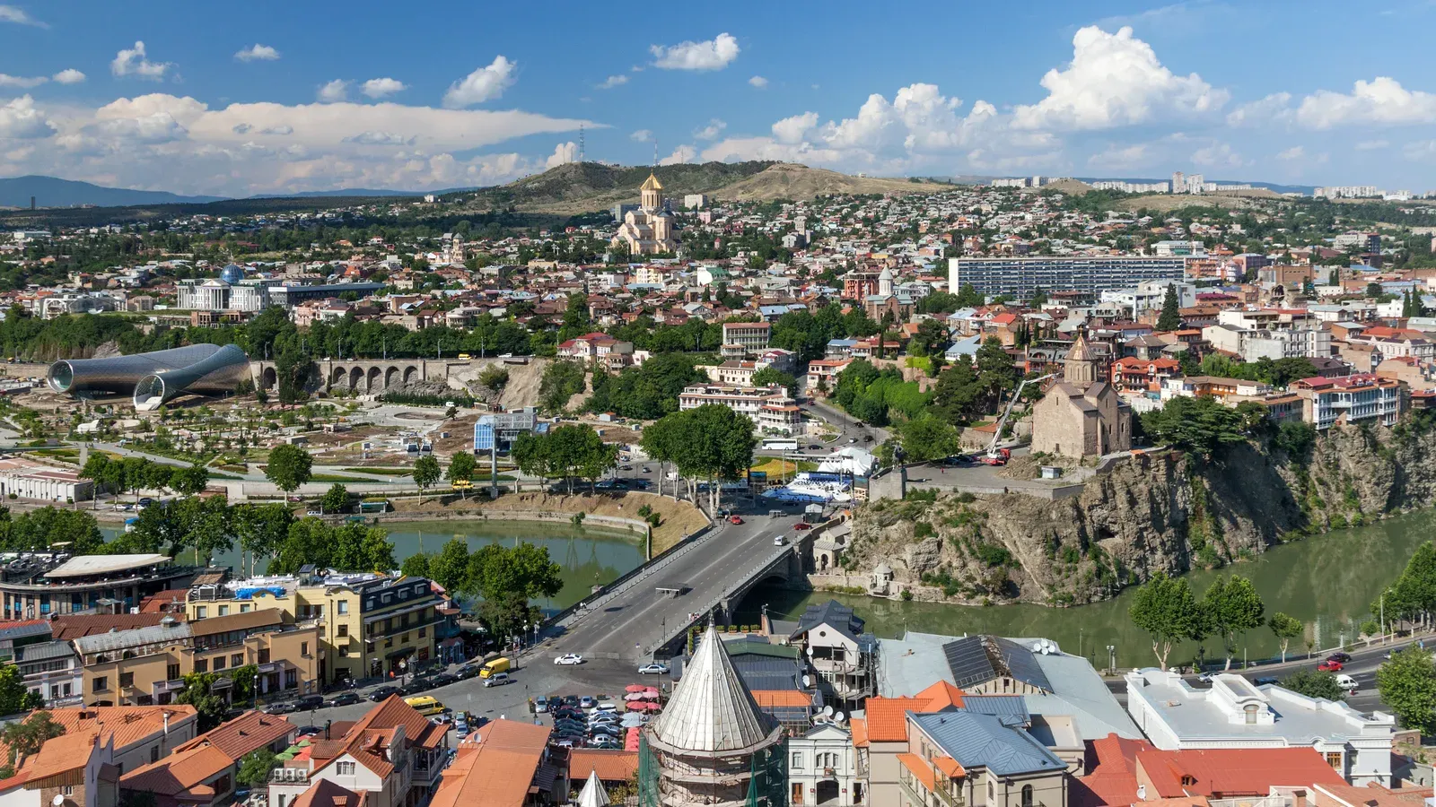 Tbilisi seen from Narikala Fortress, with the Kura River, the Metekhi cliff and Holy Trinity Cathedral on the hill beyond, Georgia